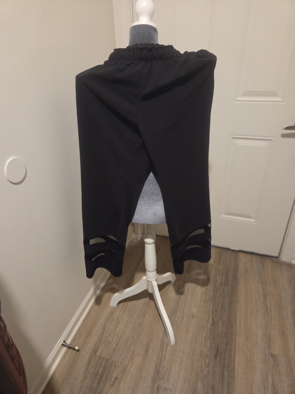Black Capri Leggings with Cutout Hem Detail